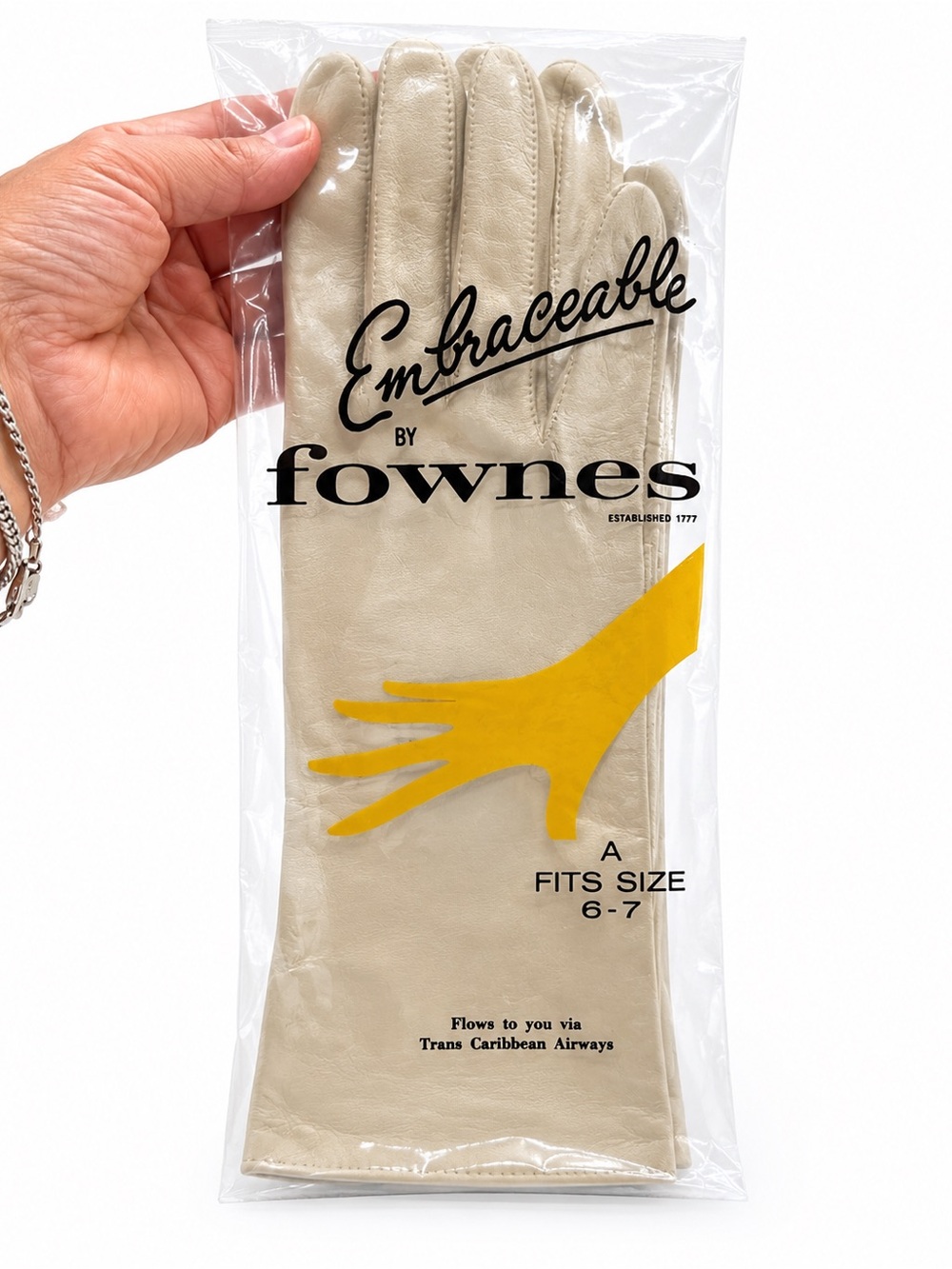 vintage 1960s Fownes Embraceable nylon gloves in a cream/off-white color